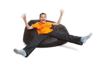 Young man on bean bag clipart