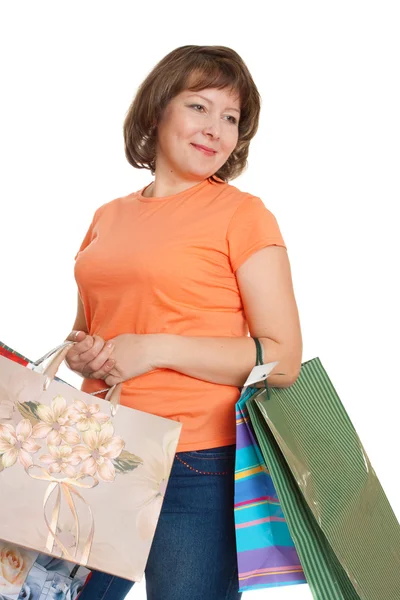 Mulher sorridente com bolsas — Fotografia de Stock