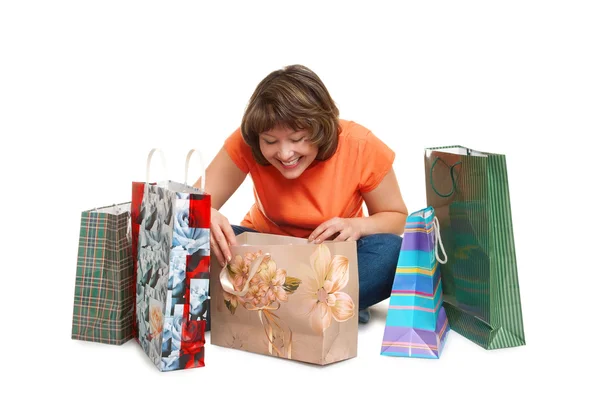 Mulher alegre com sacos de papel — Fotografia de Stock