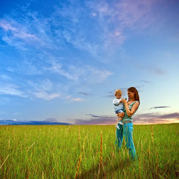 Mother and son on the filed — Stock Photo, Image