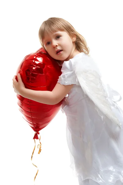 Girl holding heart balloon — Stock Photo, Image