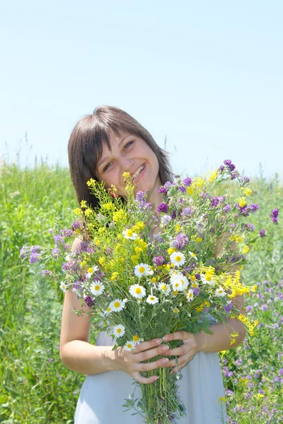 The girl collects a flowers — Stock Photo, Image