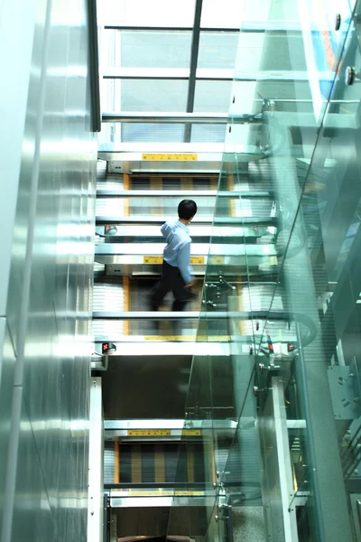 stock image Businessman walking on the elevator