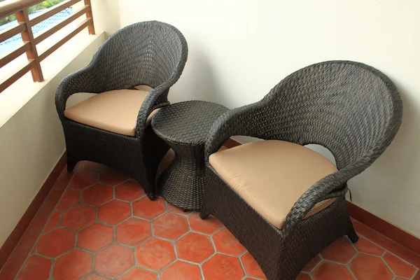 Stock image Wicker chairs in the balcony