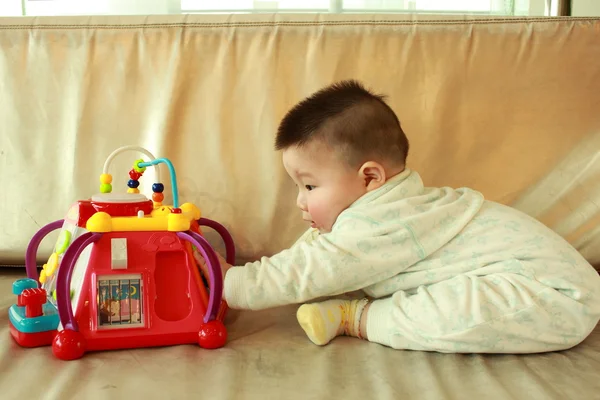 Baby playing toys — Stock Photo, Image