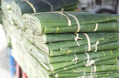 Banana leafes at the market clipart