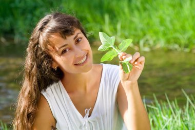 Smiling happy girl with mint clipart