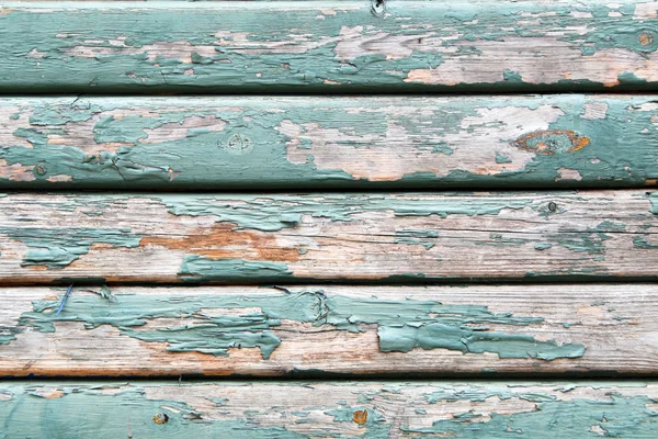 Alte Holzstruktur mit abblätternder Farbe Stockbild