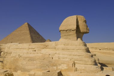 Sphinx and pyramid in Giza, Egypt clipart