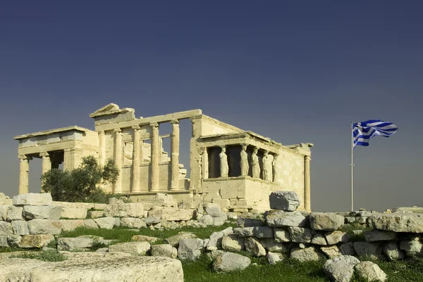Erechtheum with Greek flag in Acropolis — Stock Photo, Image