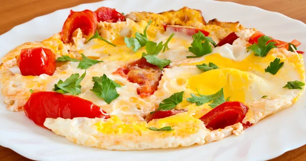 stock image Scrambled eggs with tomatoes