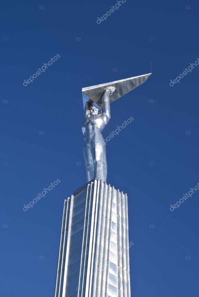 Monument - the person holding the wings