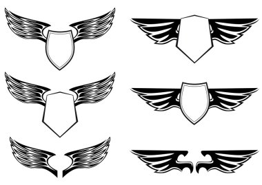 Heraldic wings with shields clipart