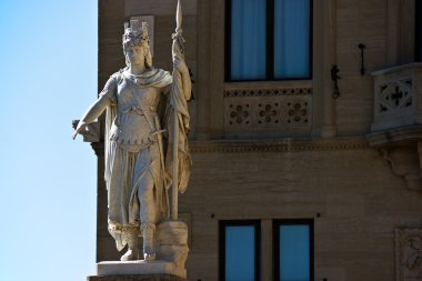 Statue of Freedom before Pablico Palazzo. San Marino. clipart