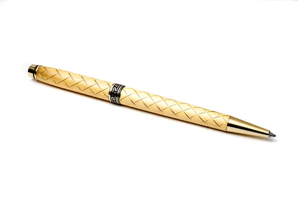 Gold ball-point pen. Isolated on a white background. — Stock Photo, Image