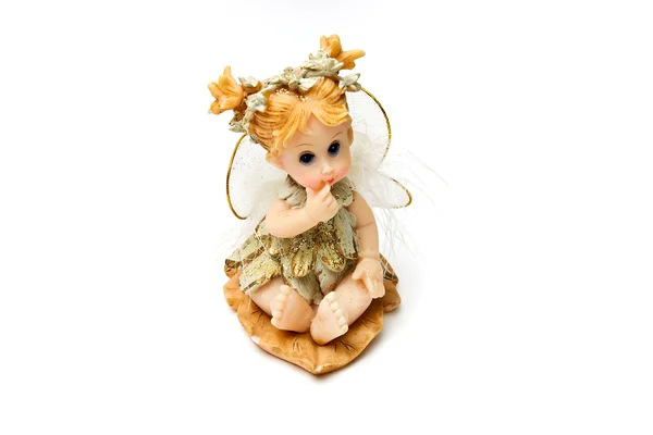 Souvenir figure of the little fairy. Isolated on a white backgro — Stock Photo, Image