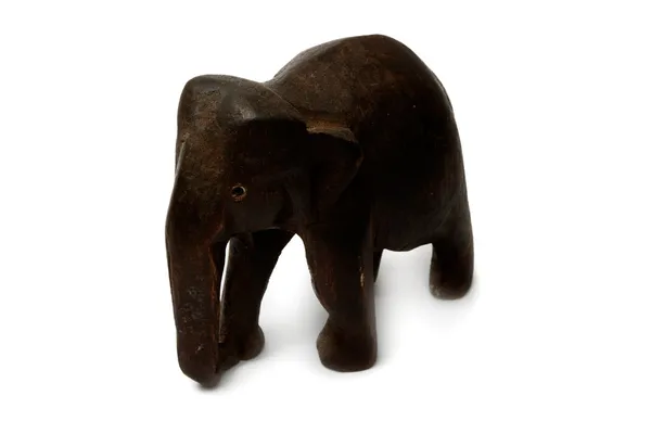 Figura de lembrança de um elefante de madeira. Isolado em backgrou branco — Fotografia de Stock