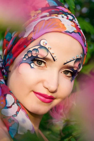 Beautiful woman with bright makeup — Stock Photo, Image