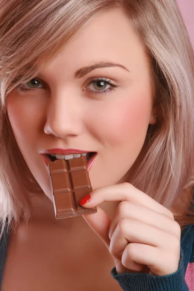 Young beautiful adult with chocolate — Stock Photo, Image