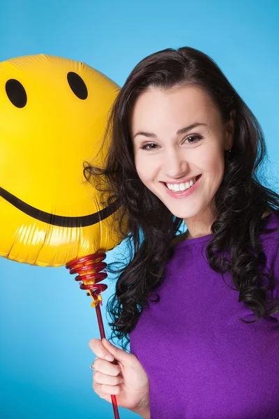 Female with yellow baloon — Stock Photo, Image