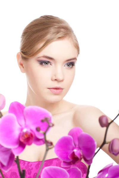 Woman with orchid — Stock Photo, Image
