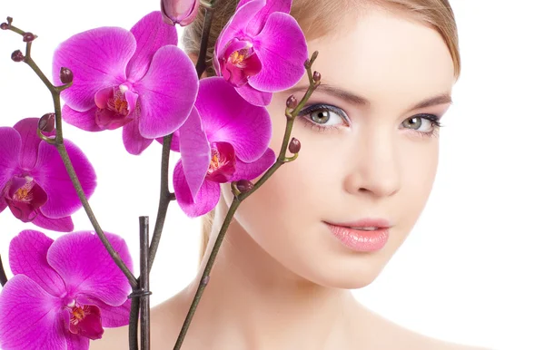Frau mit Orchidee — Stockfoto