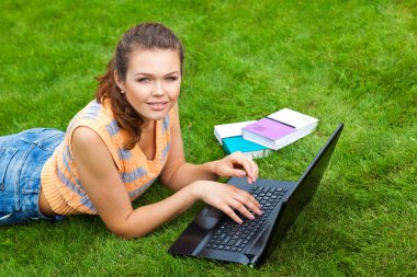 Student with laptop clipart