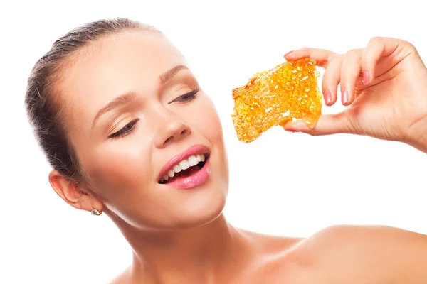 Woman with honeycomb — Stock Photo, Image