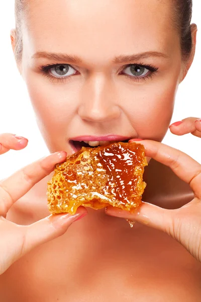 Woman with honey — Stock Photo, Image