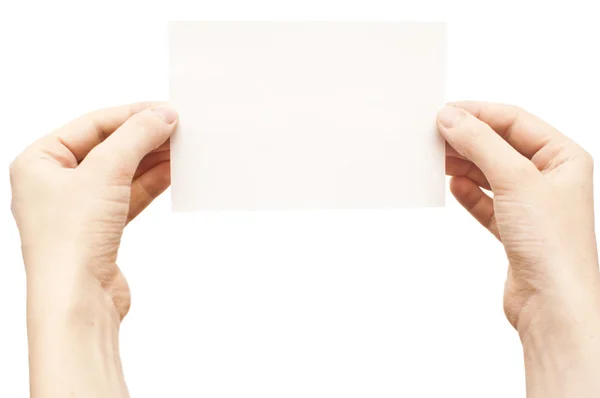 Hands holding white empty paper — Stock Photo, Image