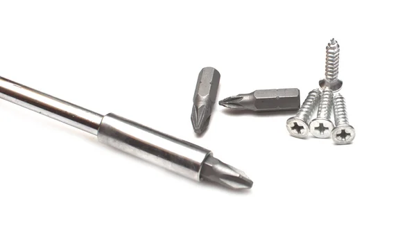 Screwdriver with different nozzles — Stock Photo, Image