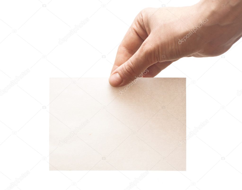 Hand holding white empty paper