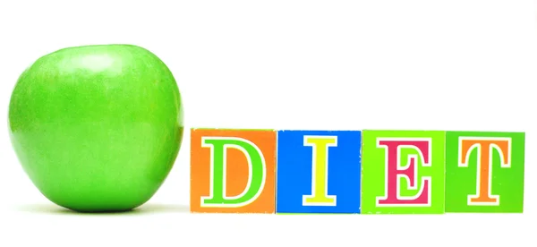Manzana verde y cubos con letras - dieta — Foto de Stock