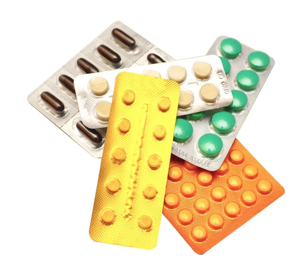 Lote de pacotes de comprimidos multicoloridos — Fotografia de Stock