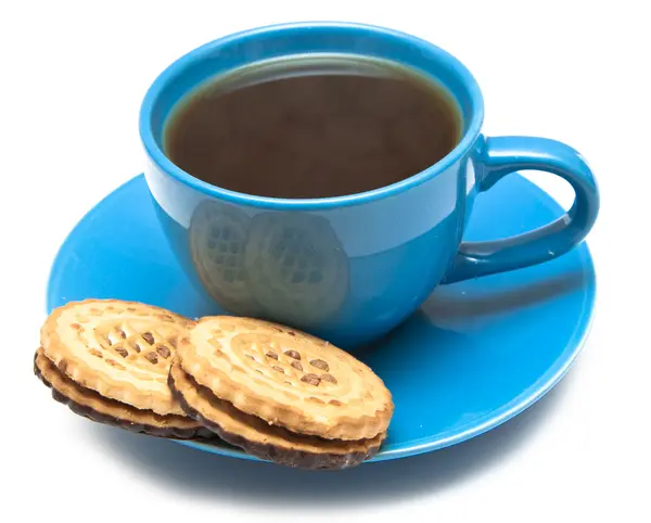 En kopp te och kakor — Stockfoto