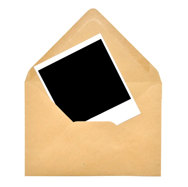 Papier envelop en polaroid frame — Stockfoto