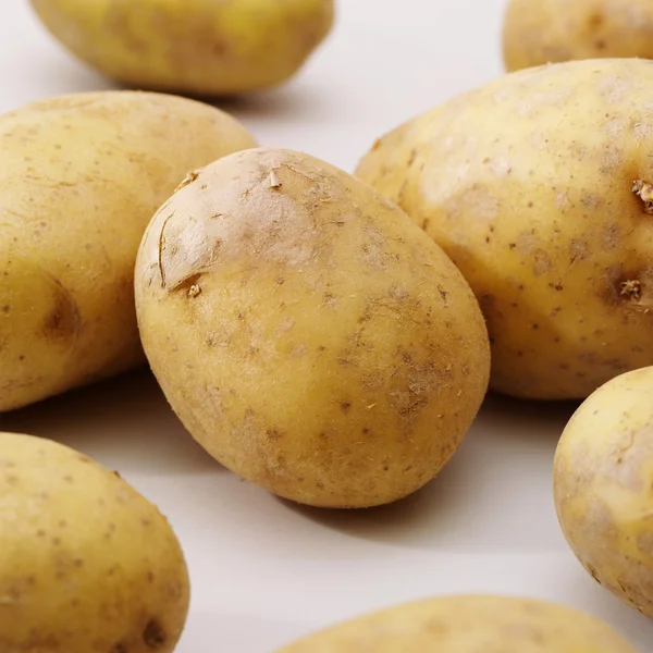 Potatoes on whit — Stock Photo, Image