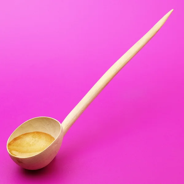 Wooden spoon with water — Stockfoto