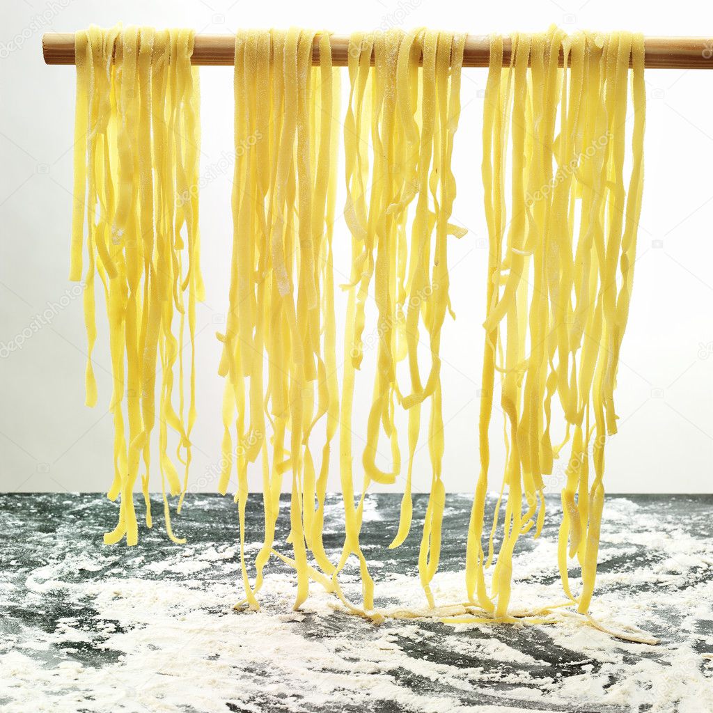 Pasta hanging to dry in the kitchen