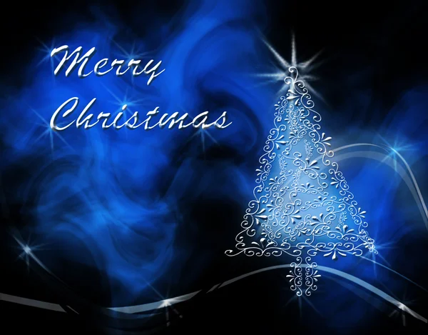 Рождественская елка на голубом фоне дыма с "Весёлым Рождеством" — стоковое фото