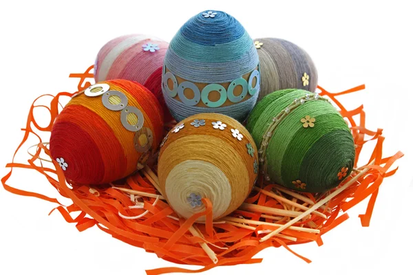 Isolated colorful Easter eggs in the nest — Stock Photo, Image