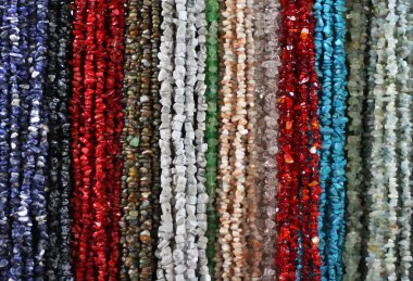 Strings of natural irregular beads clipart