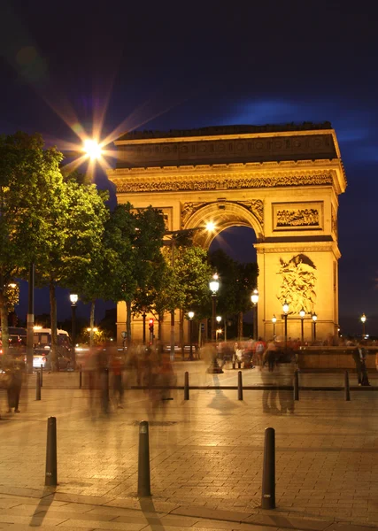 Arc De Triomphe and ghost of pedestrians — Stock Photo, Image