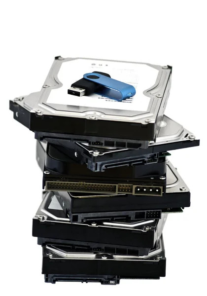 Usb flash drive liying on top of the hard drive — Stock Photo, Image