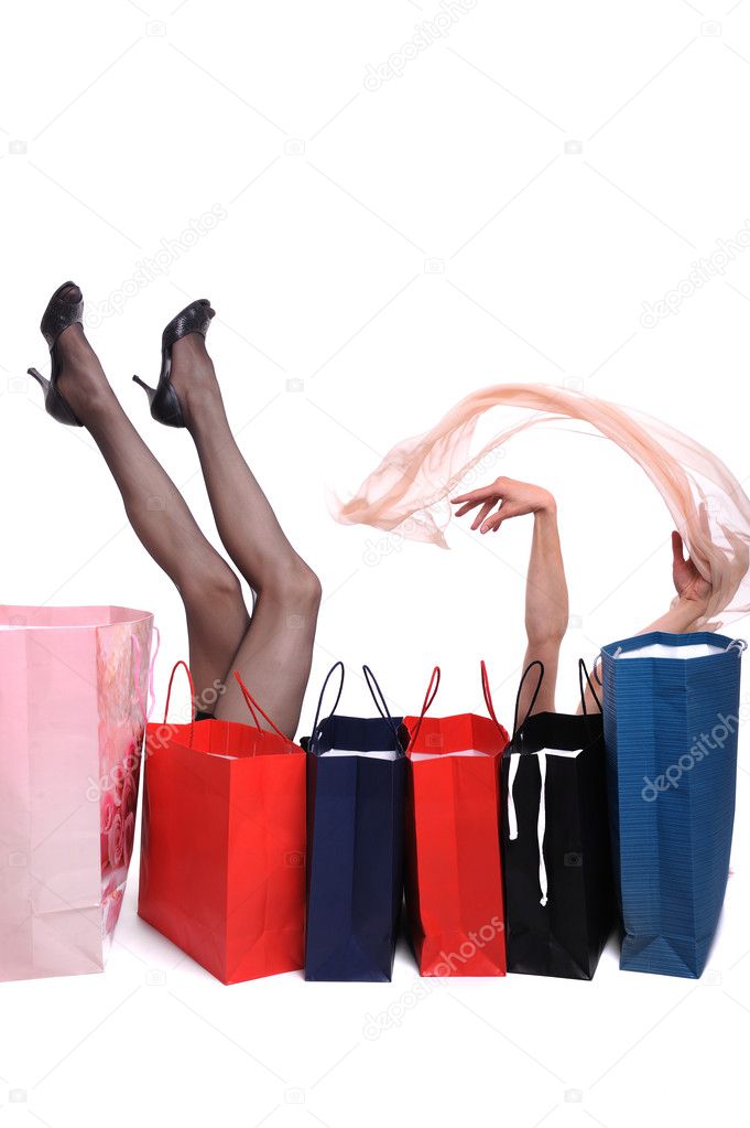 Shopping bags and woman legs