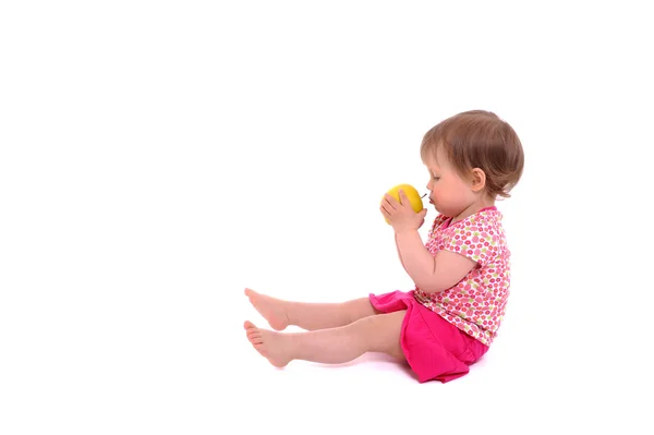 Baby girl and apple — Stock Photo, Image