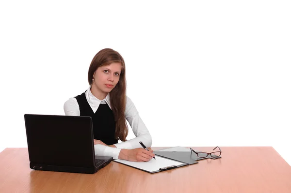 Une femme d'affaires prospère travaillant sur un ordinateur portable Images De Stock Libres De Droits