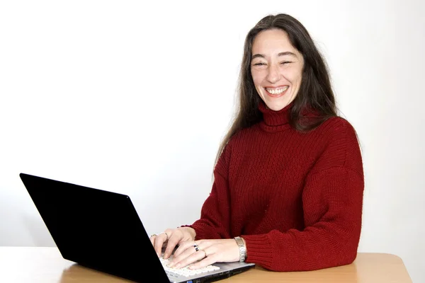 Vrouw met laptop Stockfoto