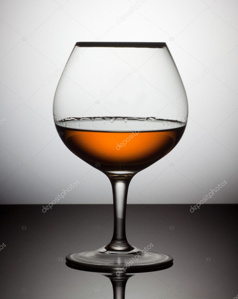 Snifter glass of cognac — Stock Photo © Valdemar 3853024