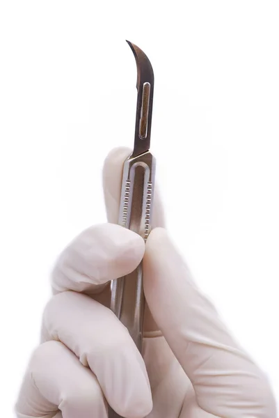 Scalpel in his hand — Stock Photo, Image